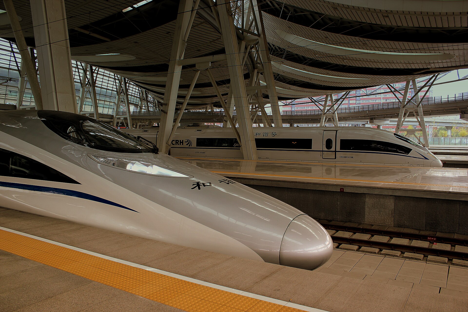 CHINA RAILWAYS HIGH SPEED(CRH) SIEMENS ICE AND HARMONY TRAIN SETS AT SHANGHAI SOUTH STATION CHINA OCT 2012
